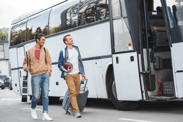 Selective Focus Man Rugby Ball Carrying Wheeled Bag While His — Stock Photo, Image