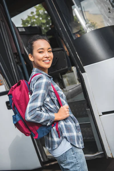 Asian Woman Backpack Posing Travel Bus Street — Free Stock Photo