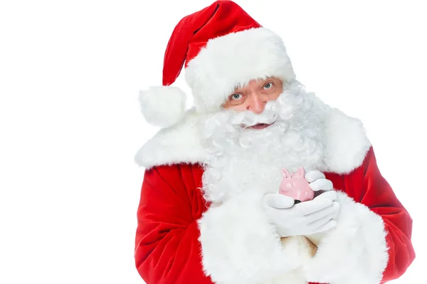 Santa Claus Segurando Pouco Porquinho Banco Olhando Para Câmera Isolada — Fotografia de Stock