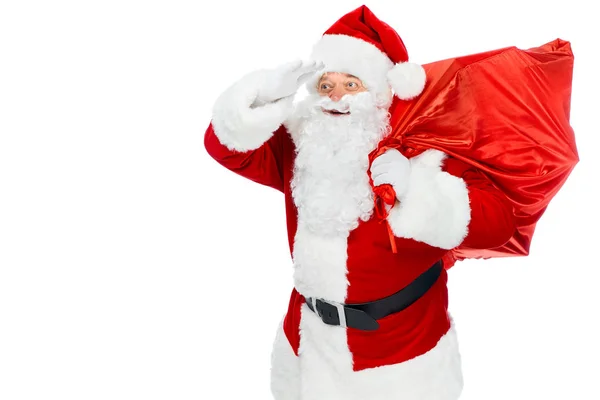 Бородатий Санта Клаус Червоною Різдвяною Сумкою Дивиться Ізольовано Білому — Безкоштовне стокове фото
