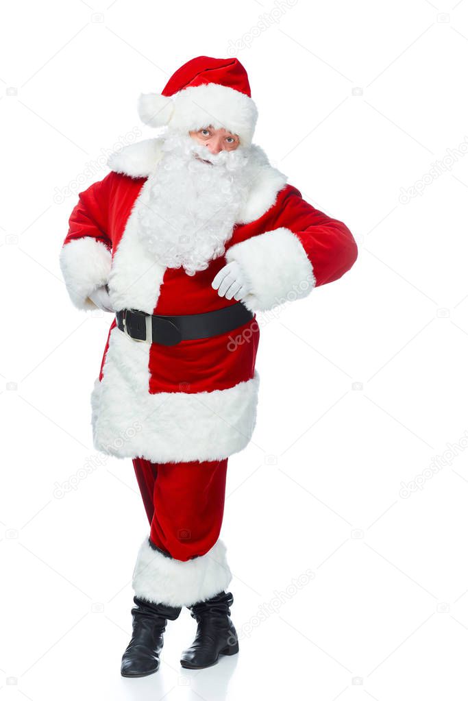 happy santa claus posing at christmastime isolated on white