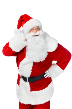 Noel Baba bir şeyler üzerinde beyaz izole kırmızı kostüm dinleme