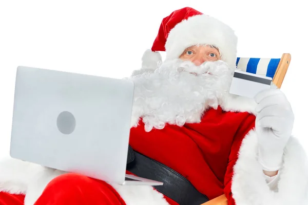 Noel Baba Dizüstü Bilgisayar Kredi Kartı Üzerinde Beyaz Izole Alışveriş — Ücretsiz Stok Fotoğraf