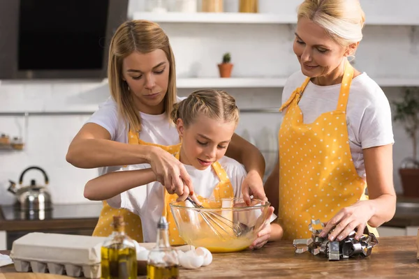 Cute Child Mother Grandmother Whisking Eggs While Cooking Together — Stock Photo, Image