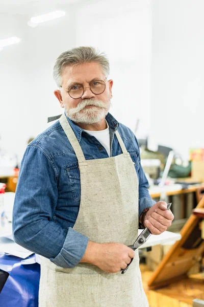 Smiling Middle Aged Male Craftsman Apron Posing Scissors Workshop — Stock Photo, Image