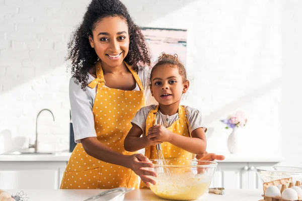 Smiling African American Daughter Mother Preparing Whisking Dough Kitchen Looking — Stock Photo, Image