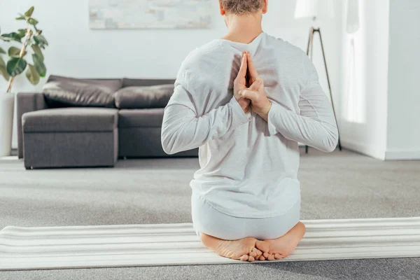 Cropped Shot Man Sitting Yoga Pose Hands Back Home — Stock Photo, Image