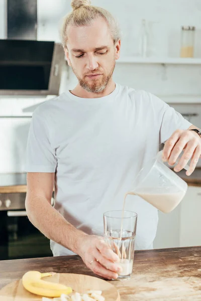Adult Man Pouring Banana Protein Shake Glass Home — Stock Photo, Image