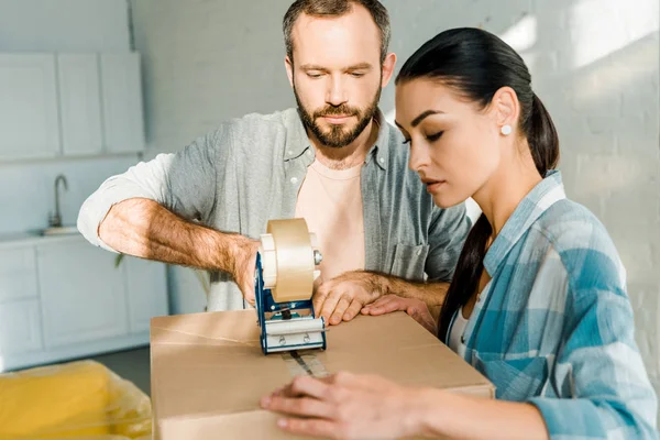 Handsome Husband Beautiful Wife Packing Cardboard Box Scotch Tape Moving — Stock Photo, Image