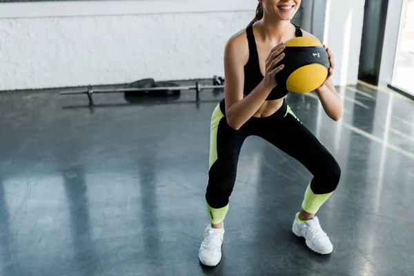 Partial View Smiling Sportswoman Doing Squats Medicine Ball Gym — Stock Photo, Image