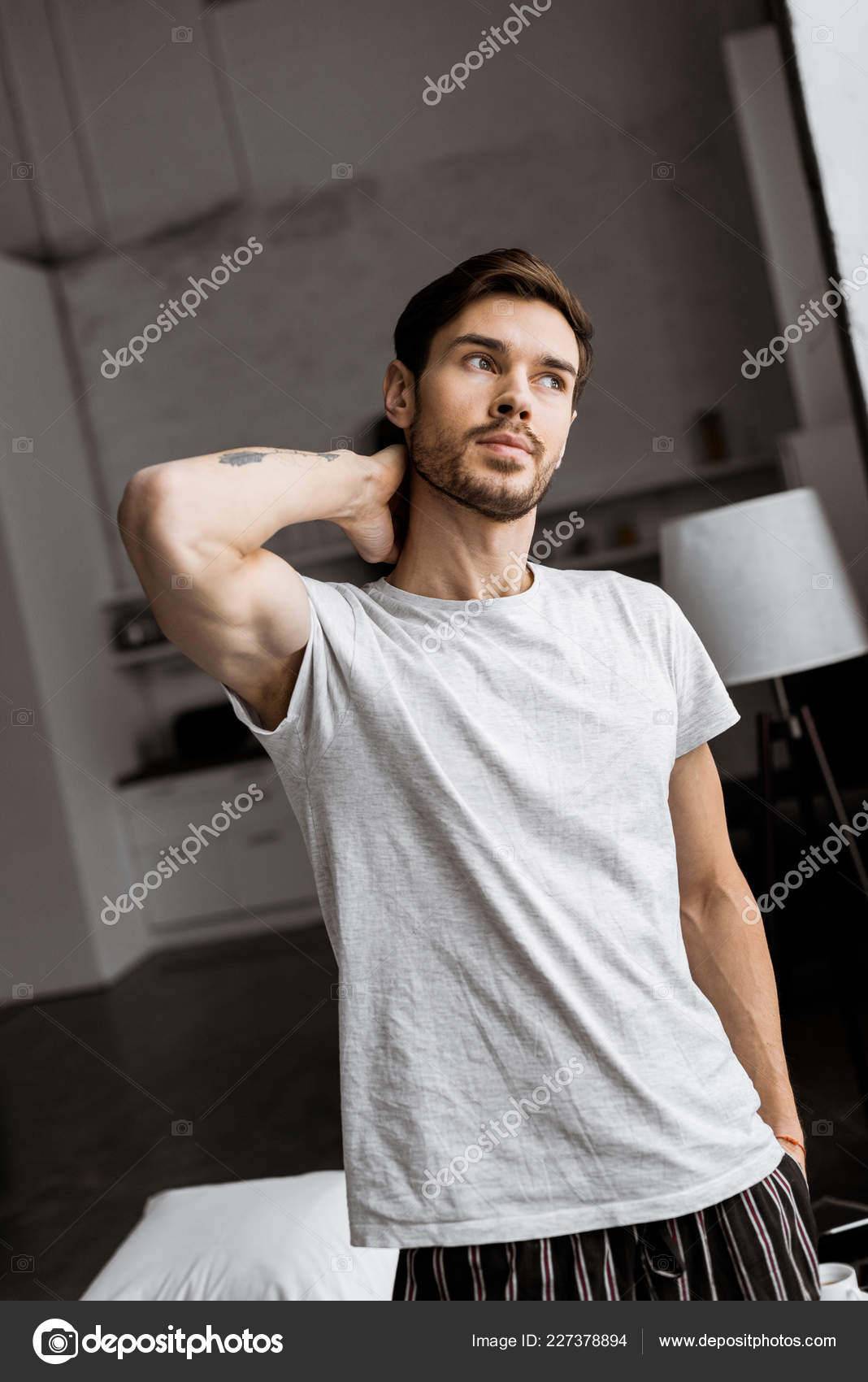 Handsome Young Man Pajamas Looking Away Home — Free Stock Photo ...