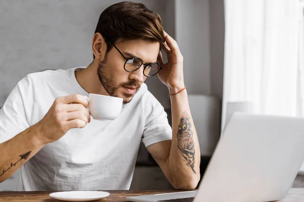 Stressed Young Freelancer Coffee Looking Laptop Screen Home — Free Stock Photo
