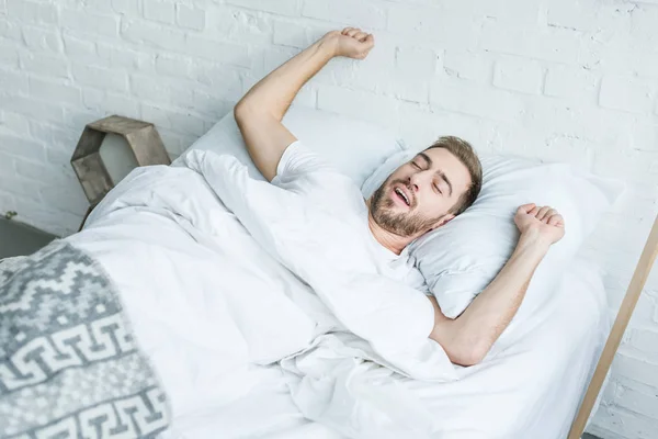 High Angle View Young Man Yawning Stretching Bed — Stock Photo, Image