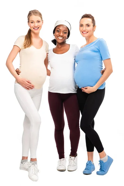 Full Length Three Pregnant Women Standing Hugging Isolated White — Stock Photo, Image