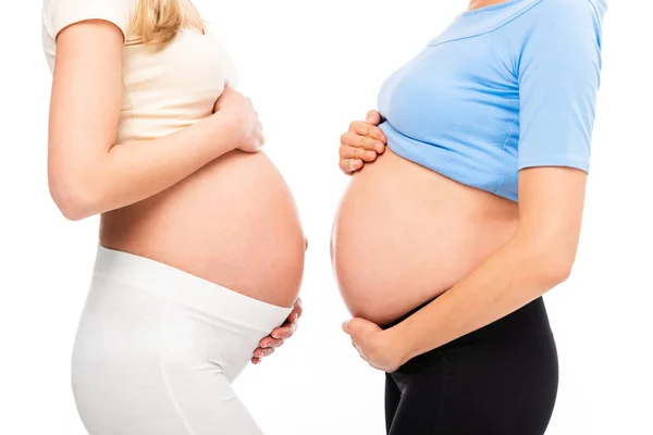 Cropped View Two Pregnant Women Showing Bellies Profile Isolated White — Stock Photo, Image