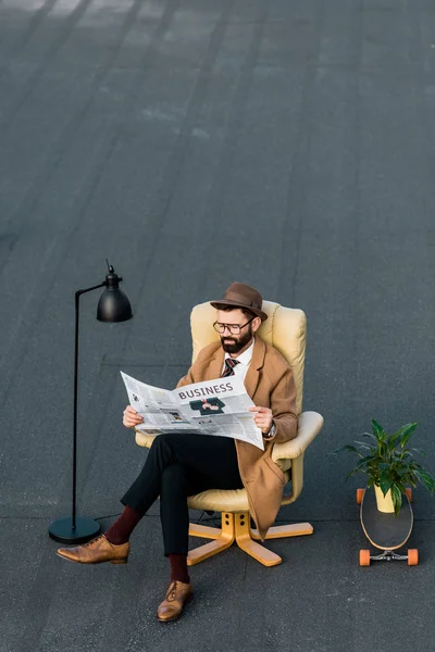 Adult Bearded Man Reading Business Newspaper Armchair Roof — Stock Photo, Image