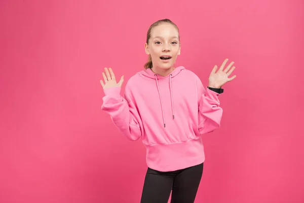 Excited Blonde Child Gesturing Looking Camera Isolated Pink — Free Stock Photo