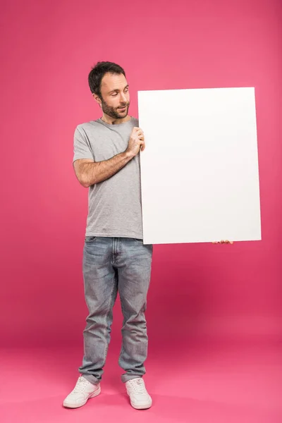 Handsome Adult Man Holding Blank Board Isolated Pink — Free Stock Photo