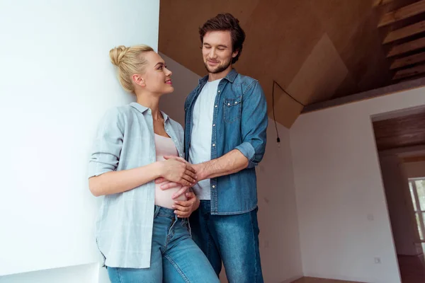 Handsome Man Smiling Touching Belly Pregnant Wife — Stock Photo, Image