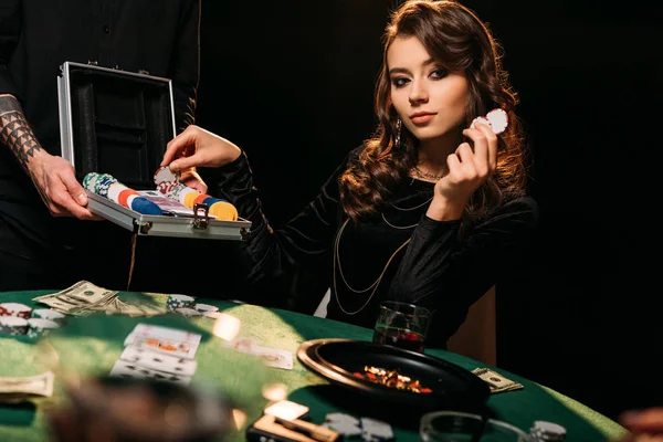 Attractive Girl Taking Poker Chips Box Table Casino Looking Away — Stock Photo, Image