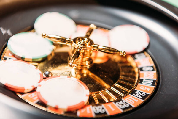selective focus of roulette and casino chips in casino
