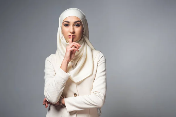 Young Muslim Woman Standing Finger Lips Looking Camera Isolated Grey — Stock Photo, Image