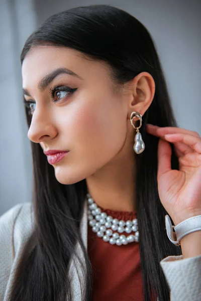 Close Portrait Beautiful Young Woman Touching Brunette Hair Looking Away — Stock Photo, Image