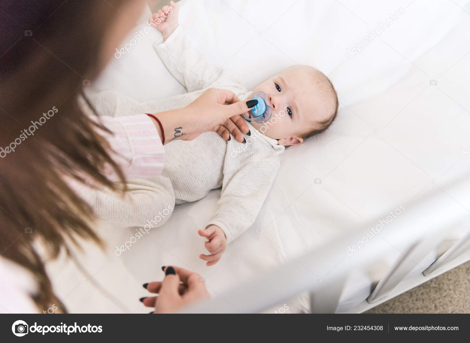 pacifier in crib
