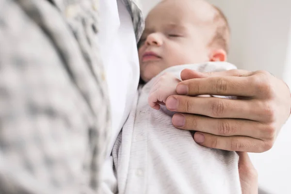 Cropped Shot Father Holding Little Sleeping Son Hands — Stock Photo, Image