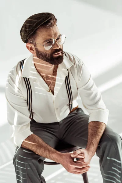 Handsome Bearded Man Clenched Hands Sitting Chair White Background — Stock Photo, Image