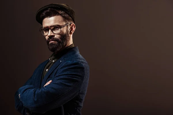 Handsome Bearded Man Arms Crossed Looking Camera Isolated Brown — Stock Photo, Image