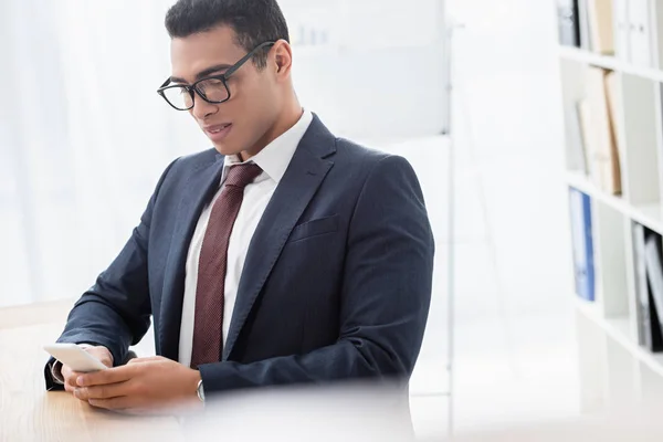 Serious Young Businessman Eyeglasses Using Smartphone Office — Stock Photo, Image