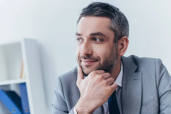 Portrait Handsome Smiling Bearded Businessman Hand Chin Looking Away Office — Stock Photo, Image