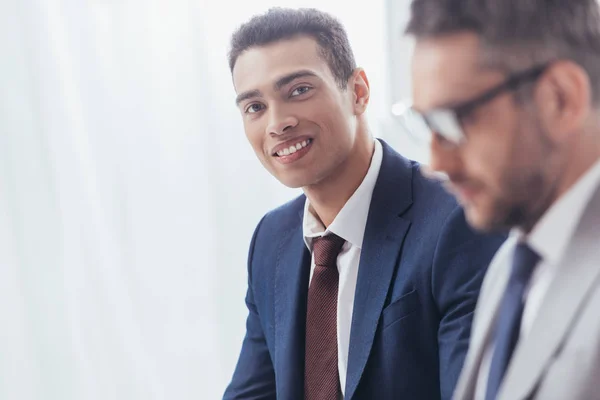 Handsome Young Businessman Smiling Camera Male Colleague Eyeglasses Standing Foreground — Stock Photo, Image