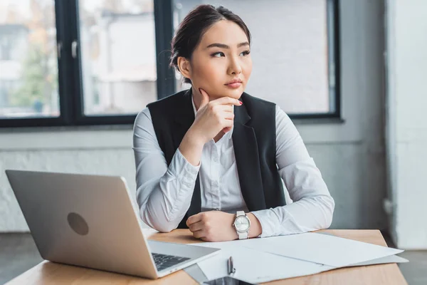 Pensive Young Kazakh Businesswoman Sitting Workplace Looking Away Office — Stock Photo, Image