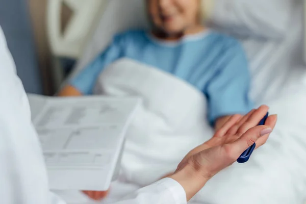Cropped View Doctor Holding Diagnosis Consulting Patient Lying Hospital Bed — Stock Photo, Image