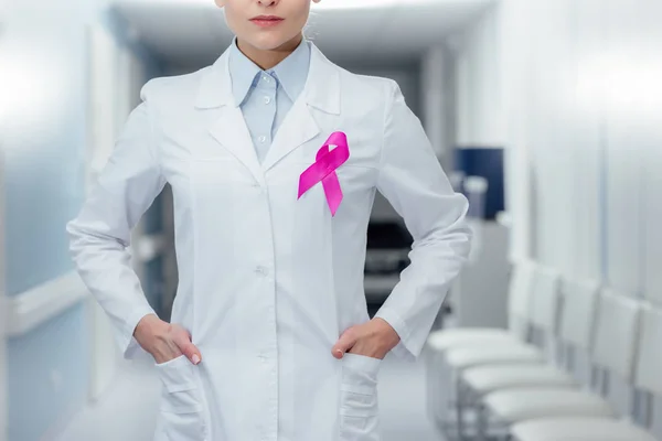 Cropped View Female Doctor Pink Ribbon Hands Akimbo Hospital Breast — Stock Photo, Image