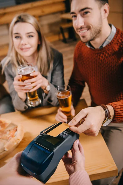 Selective Focus Man Paying Credit Card While Cashier Holding Terminal — Stock Photo, Image