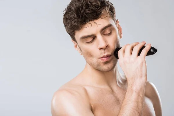Handsome Man Shaving Electric Razor Morning Isolated Grey — Stock Photo, Image