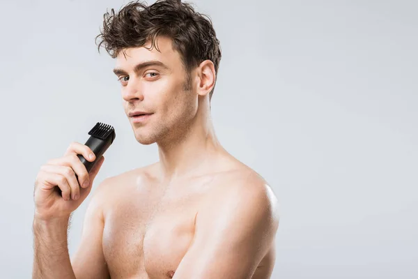 Handsome Young Man Holding Electric Razor Isolated Grey — Stock Photo, Image