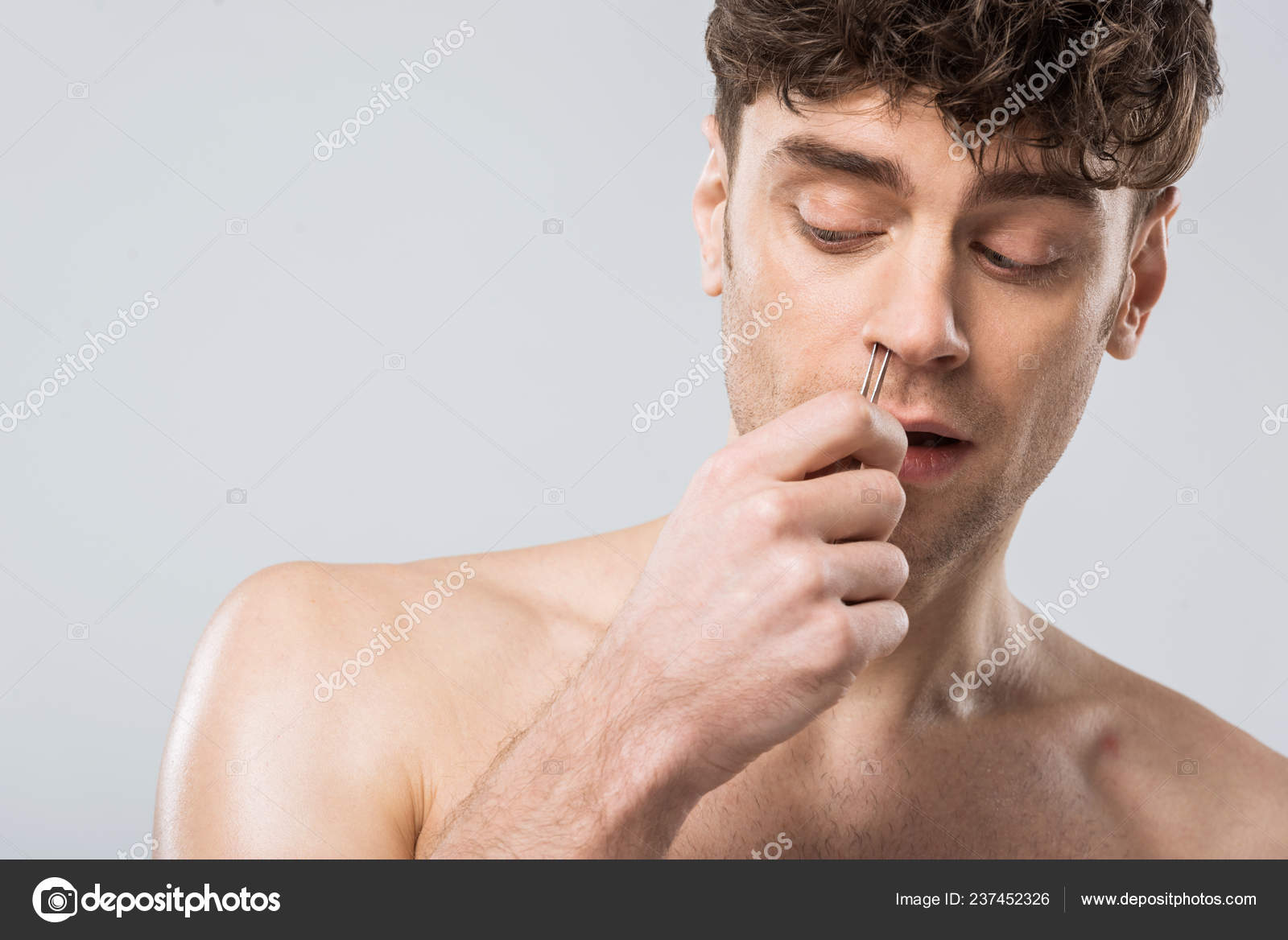Handsome Man Plucking Hair Tweezers Nose Isolated Grey Stock