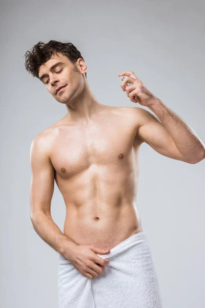 Handsome Sexy Man Spraying Perfumes Isolated Grey — Stock Photo, Image