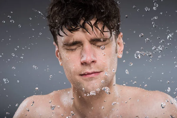 Handsome Man Washing Face Water Isolated Grey — Φωτογραφία Αρχείου