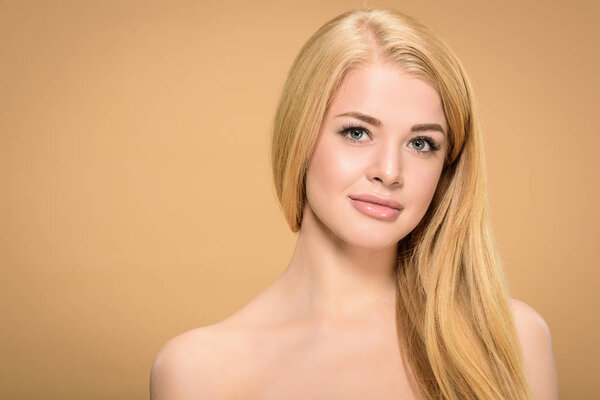 Studio shot of pretty young woman with straight hairstyle