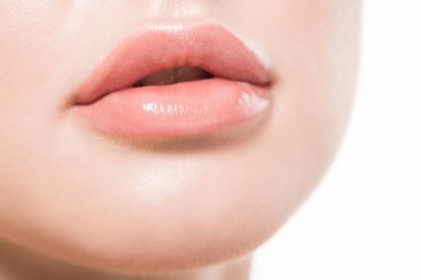 close-up view of beautiful female lips and face with perfect skin isolated on white clipart