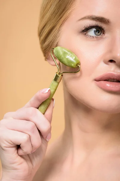 Cropped Shot Young Woman Massaging Face Jade Roller Looking Away — Stock Photo, Image