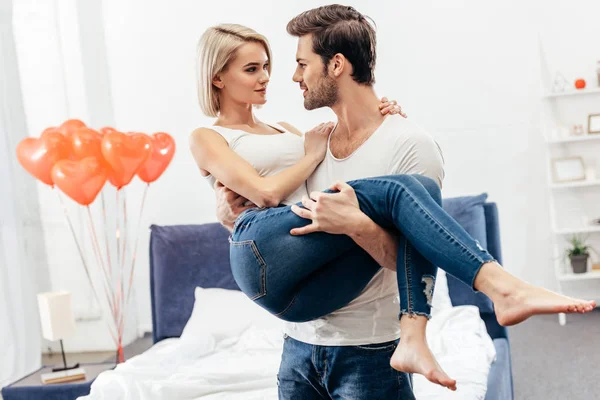 Selective Focus Handsome Boyfriend Holding Attractive Girlfriend Bedroom Valentines Day — Stock Photo, Image