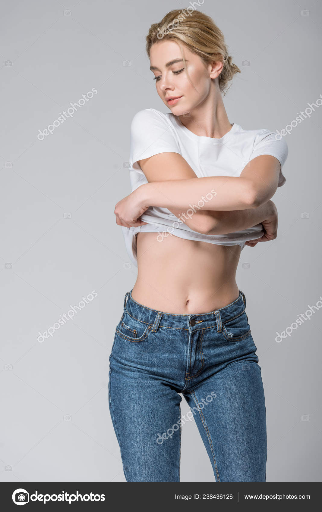 woman in jeans and shirt