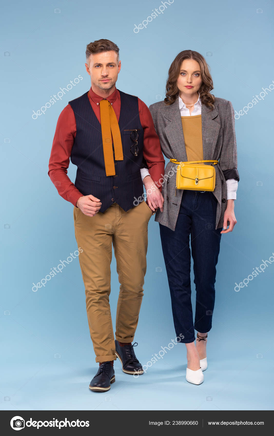 Stylish Couple Formal Wear Looking Camera While Posing Grey Background  Stock Photo by ©AllaSerebrina 238988728