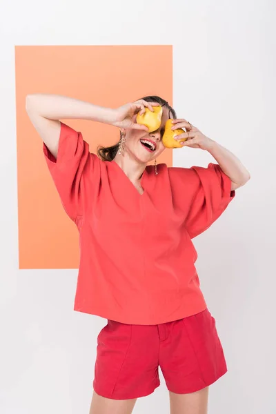 Fashionable Girl Holding Pears Front Face Posing Living Coral Background — Stock Photo, Image